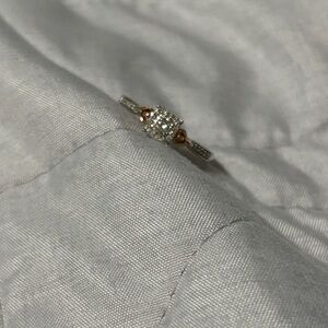 Elegant Diamond Ring with Gold Heart Accents size 7